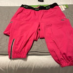 Women’s hot pink scrub pants. Iguana Flex Performance medical apparel
